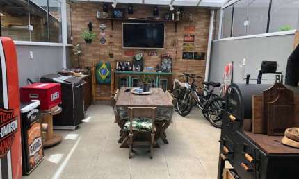 Casa com 3 dormitórios 2 suítes, área gourmet, vaga de estacionamento, Guarujá, Porto Alegre RS