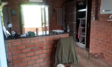 Casa com 3 dormitórios, sendo 1 suíte no bairro Hípica