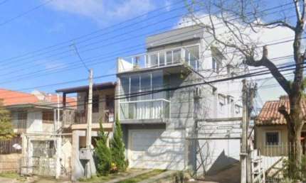 Sobrado de Alto Padrão na Vila Nova – 3 Dormitórios e 170 m² de Conforto e Estilo!