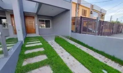 Casa com 3 quartos à venda na Rua Itacyr Rossi, --, Guarujá, Porto Alegre