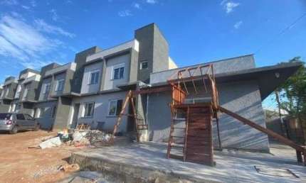 Casa Condominio em Porto Alegre, no bairro Vila Nova, com 2 dormitório(s), e 2 banheiros, à venda.