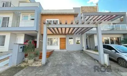 Casa em Porto Alegre, no bairro Hípica, com 3 dormitório(s), e 3 banheiros, à venda.