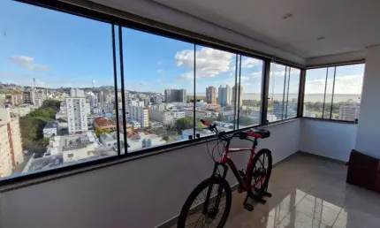 Apartamento impecável de frente no Menino Deus, 103,00 m² de área útil, 2 dormitórios, varanda integrada com churrasqueira, 2 garagens