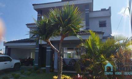 Casa com 4 dormitórios à venda por R$ 1.550.000 - Condomínio Marítimo - Tramandaí/RS