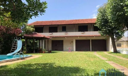 Casa com 4 dormitórios à venda, 249 m² por R$ 486.000 - Centro - Tramandaí/RS