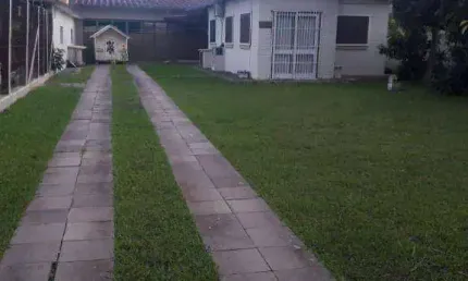 Casa com 3 dormitórios à venda por R$ 400.000 - Zona Nova - Tramandaí/RS