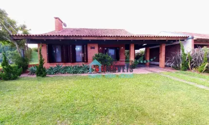 Béla casa com terreno amplo de 950m² com grande potencial para ponto comercial, de 950.000 por 860,000 - guia corrente - Imbé/RS