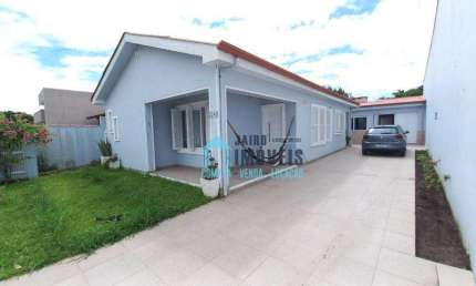 Casa com 3 dormitórios, 1 suíte à venda, 135 m² por R$ 756.000 - Centro - Tramandaí/RS