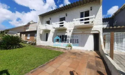 Sobrado com 4 dormitórios, sendo 3 com sacada à venda, 160 m² por R$ 900.000 - Zona Nova - Tramandaí/RS