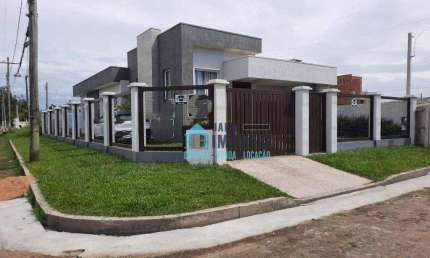 Casa de esquina a 100 metros do mar, com 6 dormitórios à venda, 150 m² por R$ 854.000 - Zona Nova - Tramandaí/RS