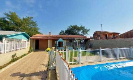 Casa com 3 dormitórios e piscina, à venda por R$ 330.000 - Centro - Balneário Pinhal/RS