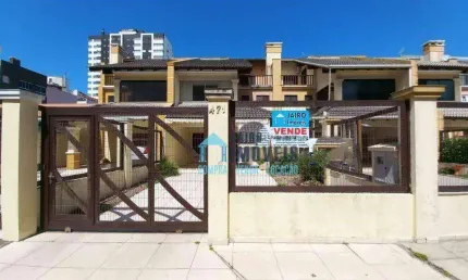Sobrado Triplex com 5 dormitórios à venda por R$ 850.000 - Centro - Tramandaí/RS