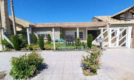 Casa com 3 dormitórios, sendo 1 suíte, poucos metros da Barra, à venda por R$ 756.000 - Centro - Imbé/RS