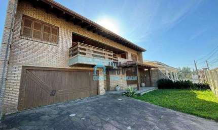 Casa com excelente padrão construtivo em avenida Central, à venda, por R$ 690.000 - Centro - Balneário Pinhal/RS