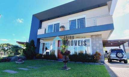 Casa com 3 dormitórios à venda, 213 m² por R$ 1.566.000,00 - Tramandaí - Tramandaí/RS