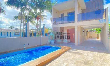 Sobrado com 3 suítes à venda, 137 m² por R$ 648.000 - Centro - Imbé/RS