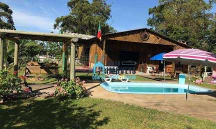 Belíssimo Sítio com duas casas e grande área de lazer, à venda, por R$ 1.250.000 - Rancho Velho - Capivari do Sul/RS