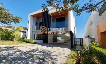 Sobrado mobiliado em condomínio fechado com 5 suítes no Alphaville 2