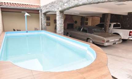 Casa com 4 quartos à venda na Rua Maestro Francisco Flores, 3, São Luiz, Belo Horizonte por R$ 1.500.000