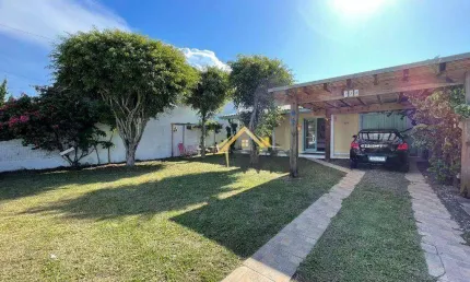 Casa com 4 dormitórios e amplo pátio à venda, por R$ 324.000 - Tramandaí/RS