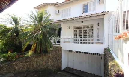 Casa em condomínio fechado com 3 quartos à venda na Rua Professora Thereza Noronha, 70, Espírito Santo, Porto Alegre, 383 m2 por R$ 860.000