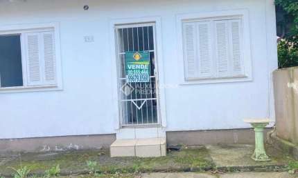 Casa com 2 quartos à venda na Rua Irerês, 283, Jardim Algarve, Alvorada, 78 m2 por R$ 300.000