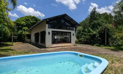 Casa em condomínio fechado com 5 quartos à venda na PITANGUEIRA, 206, São Lucas, Viamão, 249 m2 por R$ 700.000