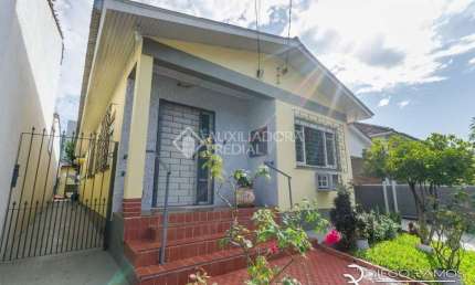 Casa em condomínio fechado com 3 quartos à venda na Rua Coronel João Pacheco de Freitas, 481, Jardim Itu Sabará, Porto Alegre, 122 m2 por R$ 690.000