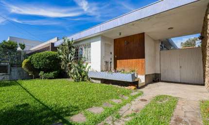 Casa com 3 quartos à venda na Rua Coronel Armando Assis, 134, Três Figueiras, Porto Alegre, 180 m2 por R$ 1.299.000