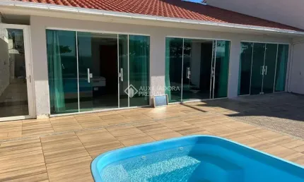 Casa com 4 quartos à venda na Avenida Ari Amâncio da Silveira, 200, Praia de Fora, Palhoça, 200 m2 por R$ 1.650.000