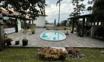 Casa com 4 quartos à venda na Rua Édio Ortiga Fedrigo, 93, Centro, Florianópolis, 250 m2 por R$ 1.600.000