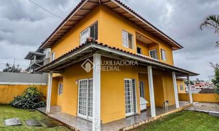 Casa com 4 quartos à venda na Rua Professora Cremilde de Oliveira, 192, Jardim Atlântico, Florianópolis, 375 m2 por R$ 1.290.000
