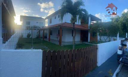 Casa com 3 dormitórios, 135 m² - venda por R$ 950.000,00 ou aluguel por R$ 6.989,73/mês - Buraquinho - Lauro de Freitas/BA