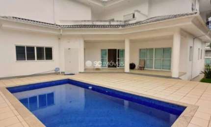 Casa em condomínio fechado com 4 quartos à venda no Cacupé, Florianópolis  por R$ 3.700.000
