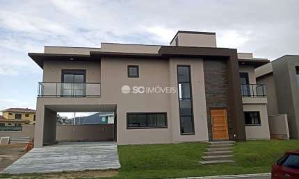 Casa em condomínio fechado com 4 quartos à venda no São João do Rio Vermelho, Florianópolis  por R$ 1.750.000