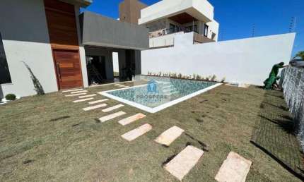 Casa em condomínio fechado em Guarajuba, 3 suítes, piscina privativa e 2 vagas de garagem