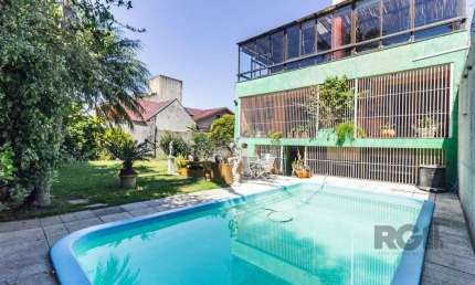 Casa 470m² - 4 dormitórios, 5 vagas no bairro Jardim São Pedro