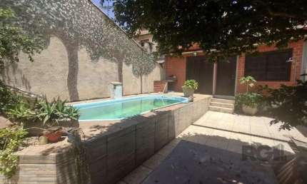 Casa com 4 quartos à venda na Rua Laguna, 181, Cavalhada, Porto Alegre