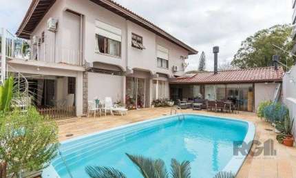 Casa com 3 quartos à venda na Avenida Montreal, 356, Jardim Lindóia, Porto Alegre