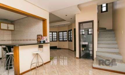Casa com 3 quartos à venda na Rua Tomé Antônio de Souza, 267, Campo Novo, Porto Alegre