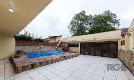 Casa para Venda - 450m², 4 dormitórios, sendo 3 suites, 5 vagas - Nonoai