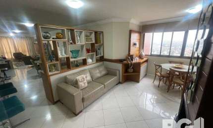 Apartamento com 3 dormitórios, 1 suíte, lavabo, 2 vagas cobertas, semimobiliado,
