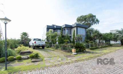 Casa em Condomínio 4 dormitórios à venda Vila Nova Porto Alegre/RS