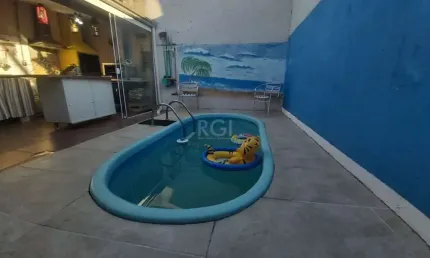 Casa com 3 quartos à venda na Rua Irmão Firmino Biazus, 230, Hípica, Porto Alegre