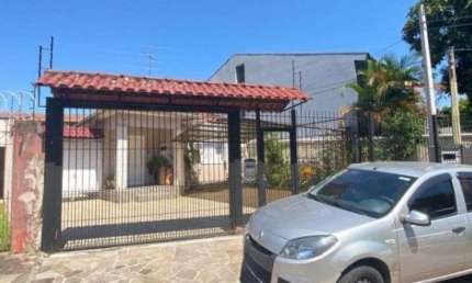 Casa 4 dormitórios I vaga 8 carros I Bairro Camaquã