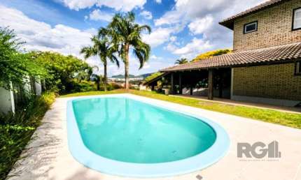Casa em Condomínio 5 dormitórios à venda Cavalhada Porto Alegre/RS