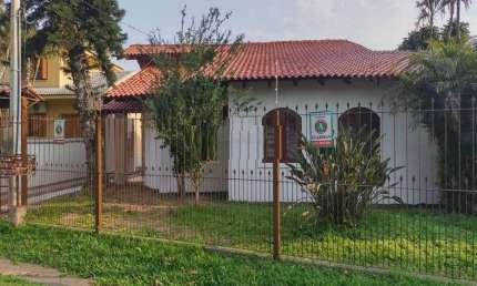 Casa com 4 quartos à venda na Avenida Guarujá, 199, Guarujá, Porto Alegre