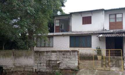 Casa com 5 quartos à venda na Rua Victor Silva, 582, Camaquã, Porto Alegre