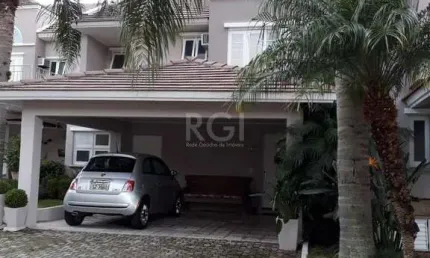 Casa em condomínio fechado, às margens do rio guaíba,