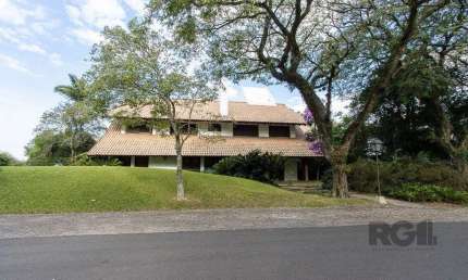 Casa em Condomínio 6 dormitórios à venda Cavalhada Porto Alegre/RS